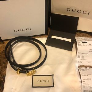 Black and gold suede Gucci belt
